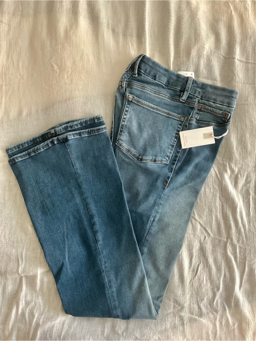 Good American Women High Rise Blue Denim Cotton blend Jeans. Medium size.